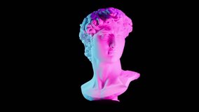 the head of an ancient sculpture of David rotating around its axis, a modern double blue-red lighting, contemporary art element,black background,3d rendering - Powered by Shutterstock - Get 15% off with code: PIKWIZARD15
