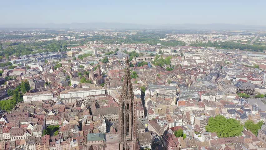 Inscription on video. Strasbourg, France. The historical part of the city, Strasbourg Cathedral. Text from small balls, Aerial View