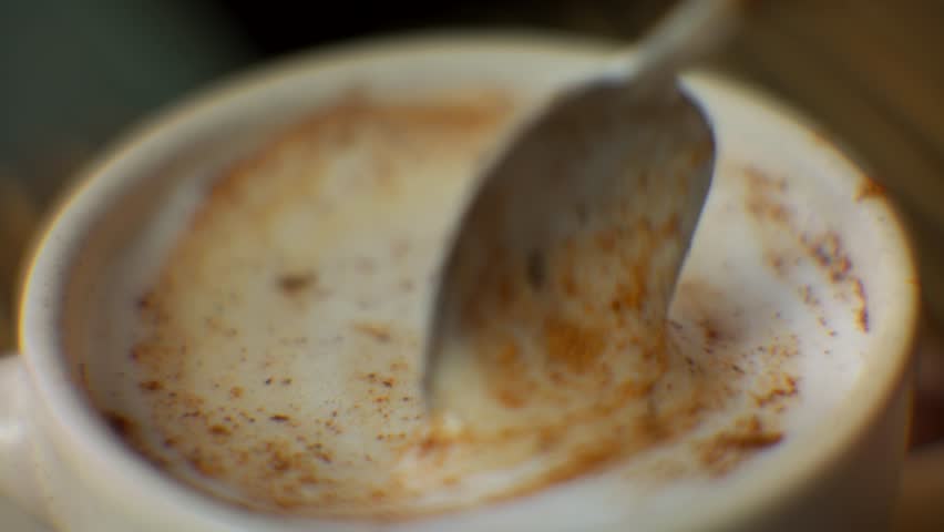Cappuccino And Cinnamon Сardamom Coffee Shop.Coffee Macchiato On Breakfast .Milk Foam Cappuccino Latte Cafe Bar.Pours Cinnamon And Cardamom In Coffee Shop Cappuccino And Stirring Sugar Froth Milk Foam | Shutterstock HD Video #1100435227