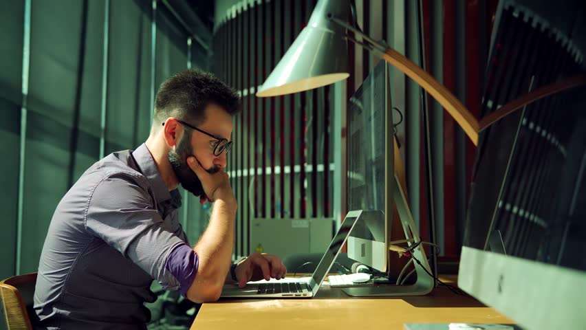 Software Developer Coding On Computer PC And Remote Chatting. Programmer Design Internet Online App.Focused Coder Development Web Application.Software Online Network Developer.Senior Coder Programming | Shutterstock HD Video #1100435271