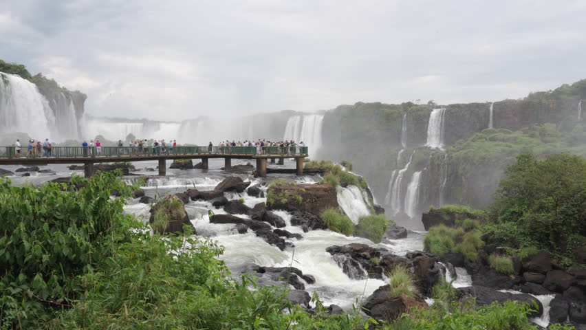 Tourists at Iguazu Falls on the border of Brazil and Argentina 