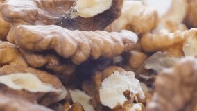 Macro video of shelled walnuts, healthy eating. 
