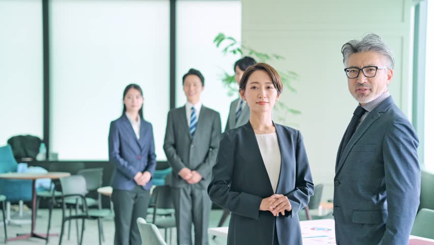 Group of businessperson standing in the office. Royalty-Free Stock Footage #1100449543