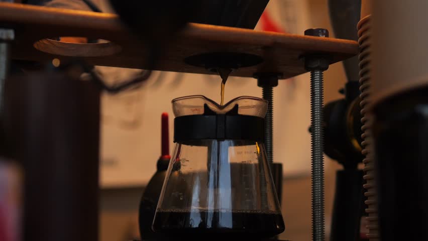 Professional Barista Preparing Fresh Coffee, Filter Drip Coffee Making Process, High Quality 4K Cinematic Gourmet Cafe Concept Footage. | Shutterstock HD Video #1100454395