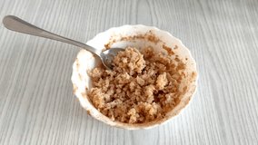 Unrecognized person eats buckwheat porridge. First person view video