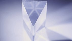 Glass Prism Refracting Light, Creating Light Rays And Rainbow Effect. closeup - Powered by Shutterstock - Get 15% off with code: PIKWIZARD15