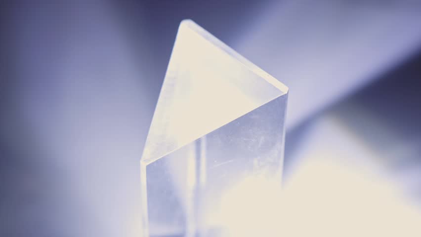 Glass Prism Bending And Splitting Light Creating Spectrum. Refraction Of Light By Prism. closeup Royalty-Free Stock Footage #1100474429
