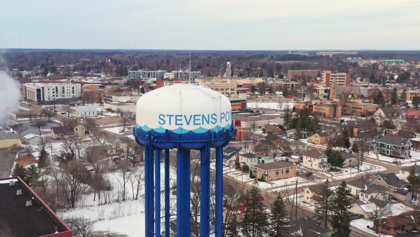 Aerial, Stevens Point water tower in Wisconsin during winter season