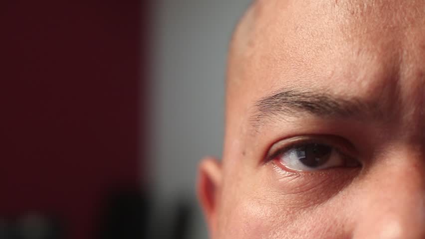 Bald asian male eye, close up | Shutterstock HD Video #1100478285