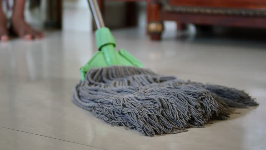 Cleaning tiles floor with mop  | Shutterstock HD Video #1100482859