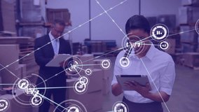 Animation of network of icons over biracial female supervisor using digital tablet at warehouse. Global networking and logistics business technology concept - Powered by Shutterstock - Get 15% off with code: PIKWIZARD15