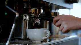 4K, Barista water white coffee mug is a mug for hot, put under coffee machine which is distilling water, flows through handle coffee maker, Into a coffee mug ready to serve. - Powered by Shutterstock - Get 15% off with code: PIKWIZARD15