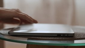 Start of modern working process. Close up shot of unrecognizable woman opening laptop at home, preparing to work at home, side view, slow motion, free space - Powered by Shutterstock - Get 15% off with code: PIKWIZARD15