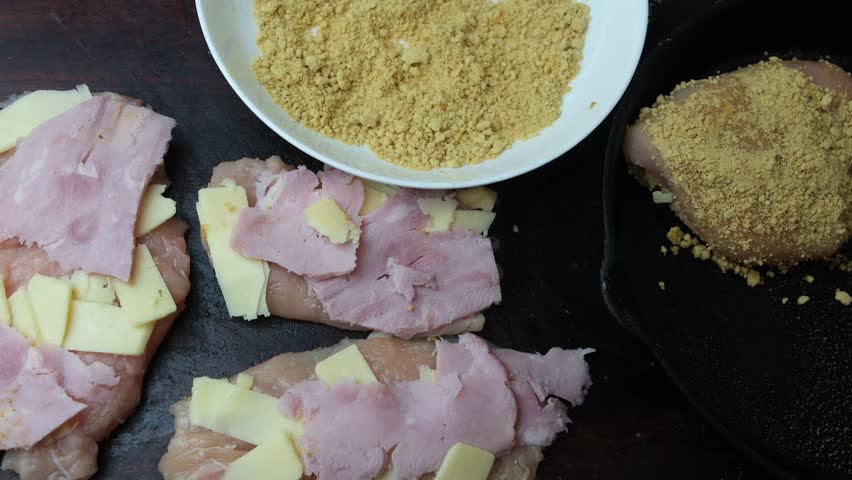 Making chicken cordon bleu at home Royalty-Free Stock Footage #1100510385
