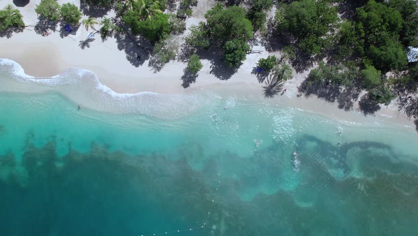 The drone aerial footage of Pigeon Point Beach in Antigua. Pigeon