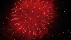 Slow motion: colorful bright fireworks in dark sky at night. Evening time, low light. Holiday, celebration, entertainment, abstract and anniversary concept - Powered by Shutterstock - Get 15% off with code: PIKWIZARD15