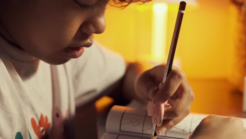 Video of Asian kid girl writing tracing lines with pencil. Prewriting practice to prepare hands for write letters. Children education concept. lowlight shot. Royalty-Free Stock Footage #1100520767