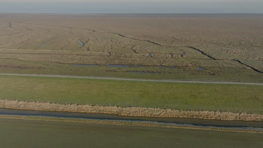 Salt Marsh Sea Defence Dike The Wash Norfolk UK Aerial Landscape Frosty Misty Morning Winter Coastline