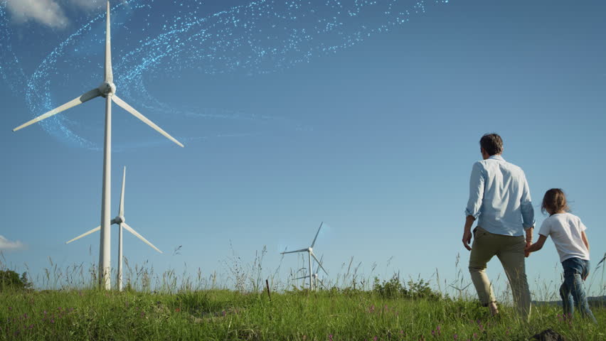 Father And Daughter Walking Through Wind Farm. Professional Male Engineer Showing Next Generation Sustainable Green Energy Resources. VFX Graphics Animation Visualizing Air Particles Moving the Blades Royalty-Free Stock Footage #1100533177