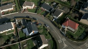 Detached houses in residential area, Mayenne in France. Aerial top-down forward