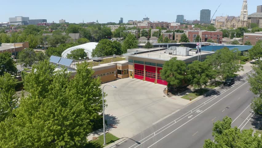 Aerial Establishing Shot of Urban Firehouse in Downtown Chicago