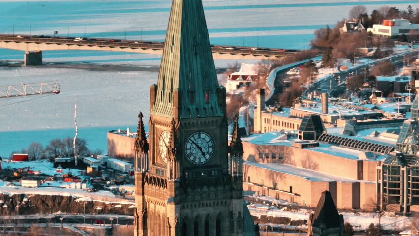 Frozen ottawa river and parliament peace tower in canada Royalty-Free Stock Footage #1100535735