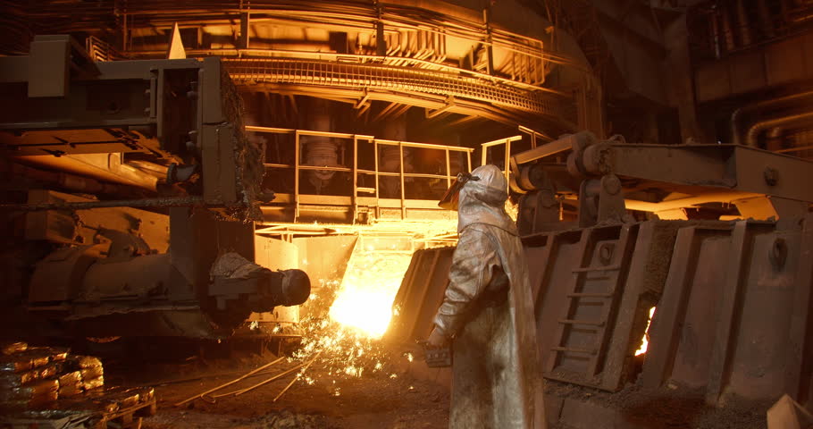 Metal casting process in metallurgical plant. Liquid metal pouring into molds Royalty-Free Stock Footage #1100544119