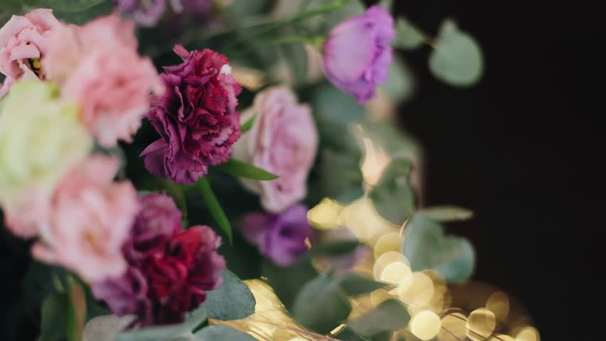 Super-large plan of fresh flowers in a bouquet on a festive day. Royalty-Free Stock Footage #1100544155