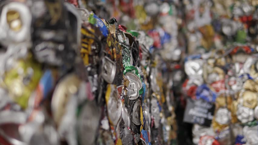 Garbage Recycling Factory, Plastic cubes for recycle Plant, Bales of pressed boxes, rubbish warehouse collection. Preparation of recyclables for recycling, Plastic city garbage.