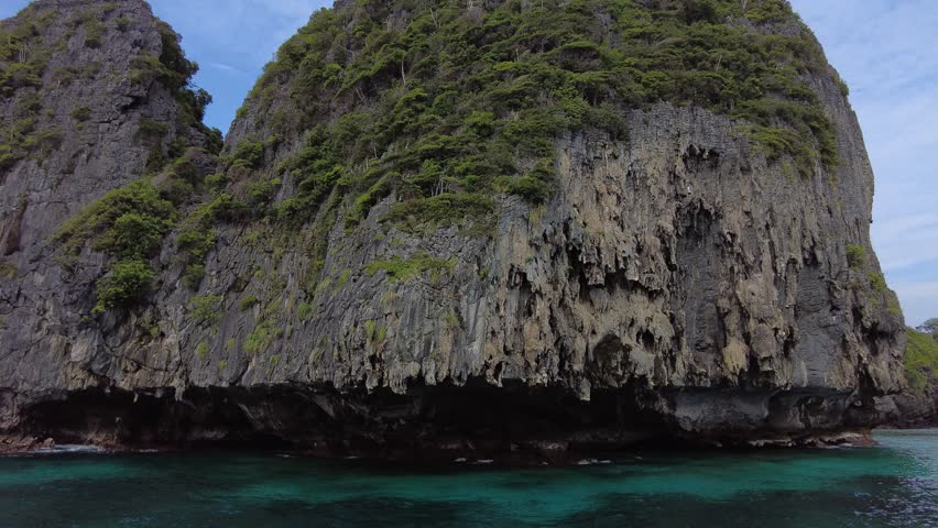 
Limestone cliffs of Phi Phi Don island, rocks and sea, nature on Phi Phi Islands | Shutterstock HD Video #1100567455