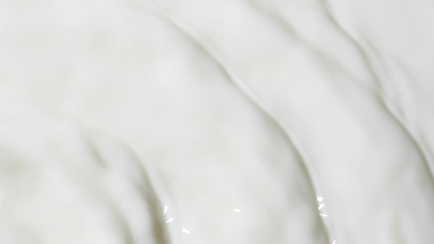 Slow motion white liquid cream ripples, close-up fresh milk drink splash texture | Shutterstock HD Video #1100569751