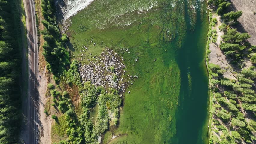 Aerial Topdown Of Kootenai Falls Flowing On The Kootenai River With Lush Greenery In Libby, Montana, USA.