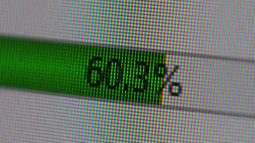 extremely close-up of the scale of downloading and transferring files on the screen of a computer monitor. uploading files to the server.selective focus - Powered by Shutterstock - Get 15% off with code: PIKWIZARD15