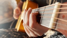 Classic guitar girl play. musician jazz acoustic a instrument concept. guitarist country girl hands close-up plays at the window indoors. learning to play the guitar lifestyle - Powered by Shutterstock - Get 15% off with code: PIKWIZARD15