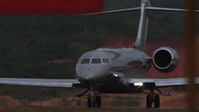 Footage of private business jet taxiing. Airfield. Airplane silhouette on the taxiway - Powered by Shutterstock - Get 15% off with code: PIKWIZARD15