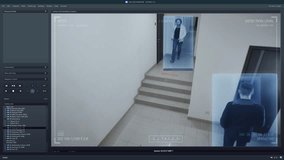 Playback office CCTV camera on computer. Workers walk in business office corridor. AI software with facial recognition and personal profiles. Security camera with digital face scanning analyze system.