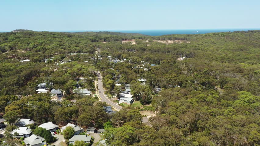 Lake Macquarie Murrays beach tree woods town residential streets houses.
 Royalty-Free Stock Footage #1100596205