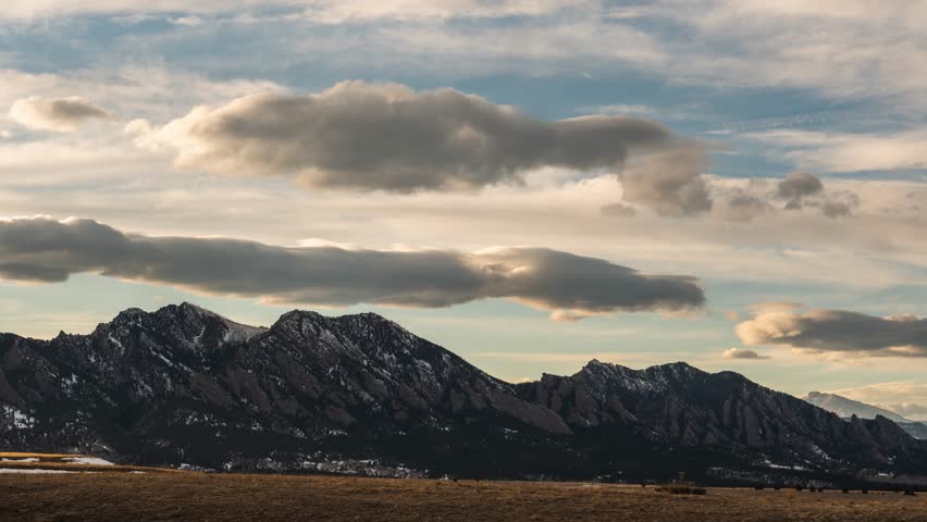 Time Lapse of Lenticular Clouds over Boulder Colorado Mountains at sunset