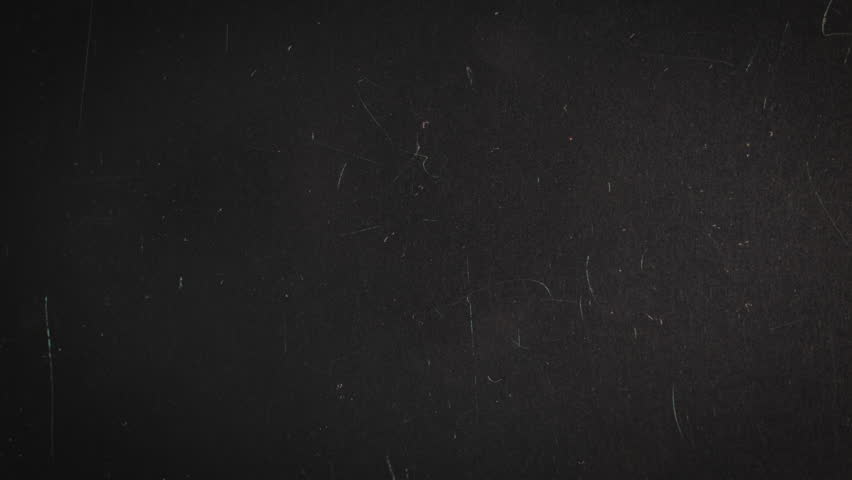Scratches on glass on a dark background. Can be used as a background or overlay Royalty-Free Stock Footage #1100605903