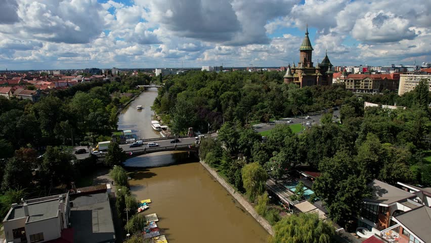 Flying over the city of Timisoara in Romania, European cultural capital in 2023 during a beautiful sunny day