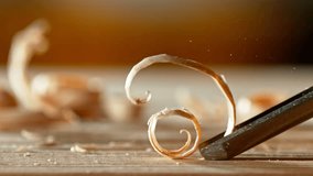 Super slow motion of detail of carving wood with a chisel. Low depth of focus, super macro shot. Filmed on high speed cinema camera, 1000 fps. - Powered by Shutterstock - Get 15% off with code: PIKWIZARD15