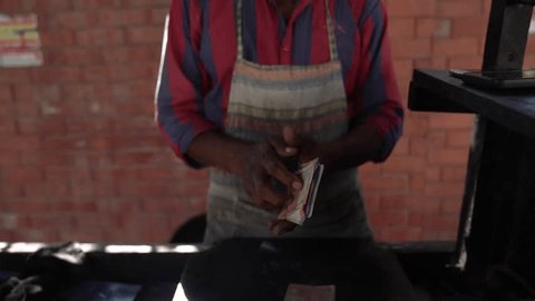 Indian Street Vendor Counting Money - Concept of Indian Small Roadside Stall Business owner, Profit making, banking, and government Video Stok