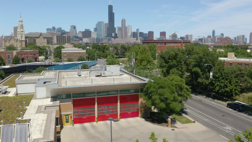 Chicago Fire Station, Aerial View with Skyscrapers in Background. Drone Shot