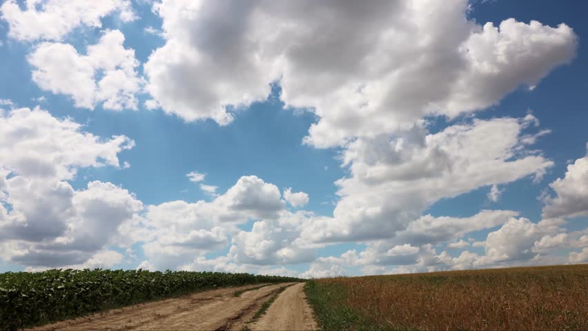 Cloud Movement In Timelapse Over Agriculture Field 