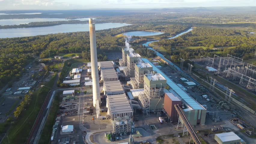 Aerial drone view of Eraring Power Station, Australia’s largest coal fired power station consisting of steam driven turbo alternators located at Eraring, NSW, Australia