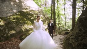 Couple Hiking Through Dismal Canyons, Slow Motion, Fun walk - Powered by Shutterstock - Get 15% off with code: PIKWIZARD15