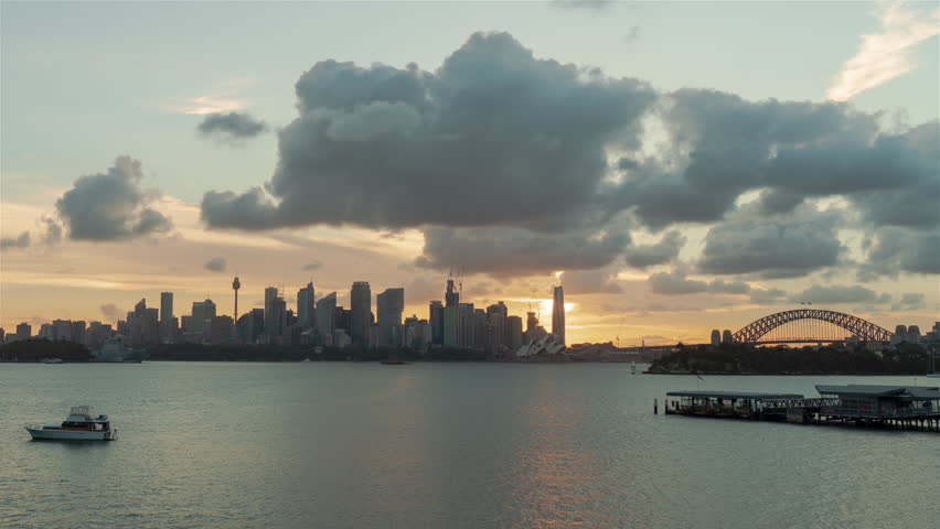 Day to Night Timelapse of Sydney Harbour with a fiery orange red sunset