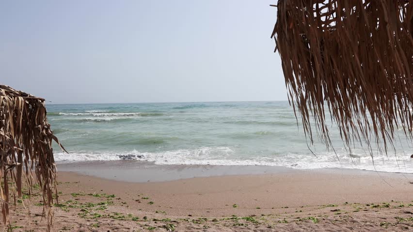 Sea Waves Rolling On The Sandy Shore Of A Beach In Vama Veche, Romania - wide