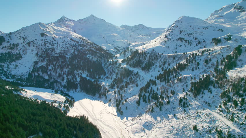 Meribel, France: Aerial view of famous ski resort in French Alps (Savoie Alps) mountains in winter, sunny day with lot of snow - landscape panorama of Europe from above