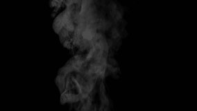 Background slow motion video of smoke from boiling water. Steam rises on a black background. High quality 4k footage